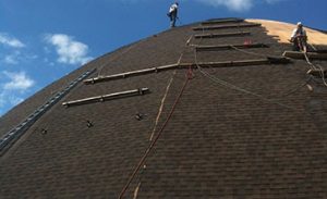 Installing a roof on dome that stores sand