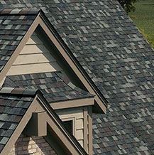 Architectural shingles installed on peak of roof